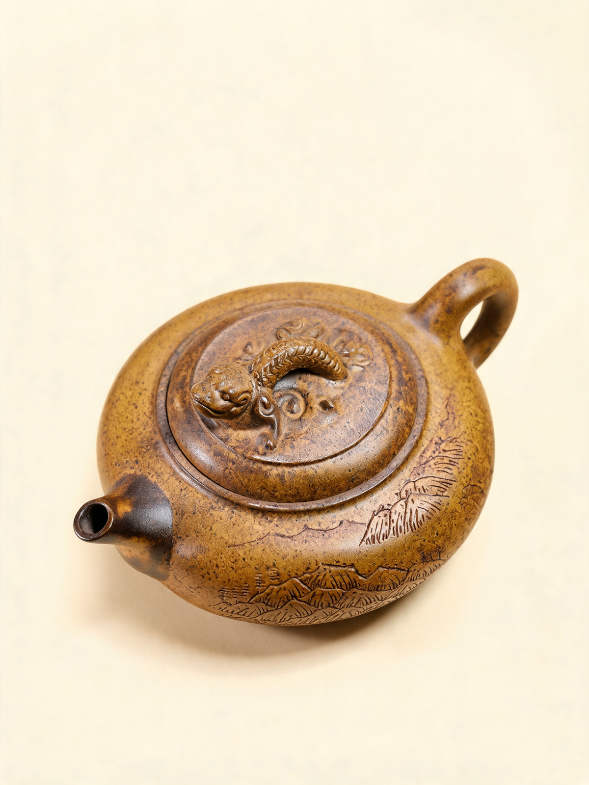 Ling Bao Teapot carved mountain landscape and closed ring handle