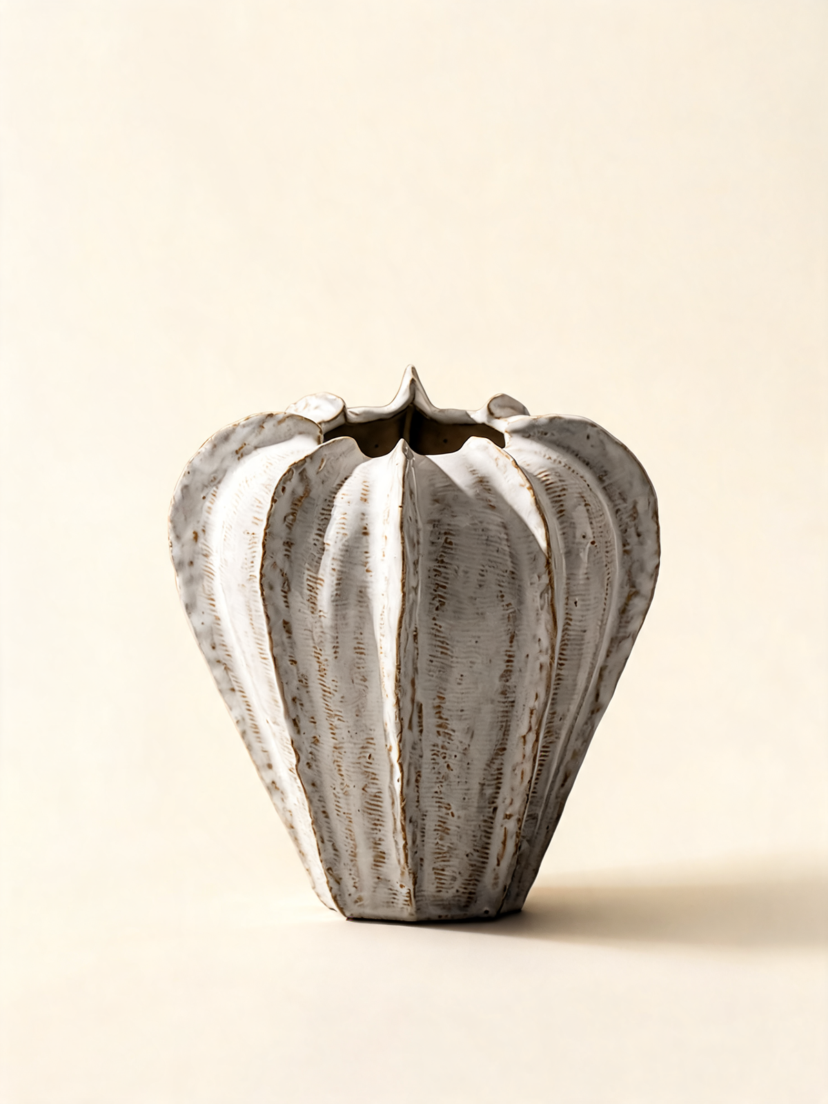 Ribbed Ceramic Vase with cream crackled glaze and earthy ridges