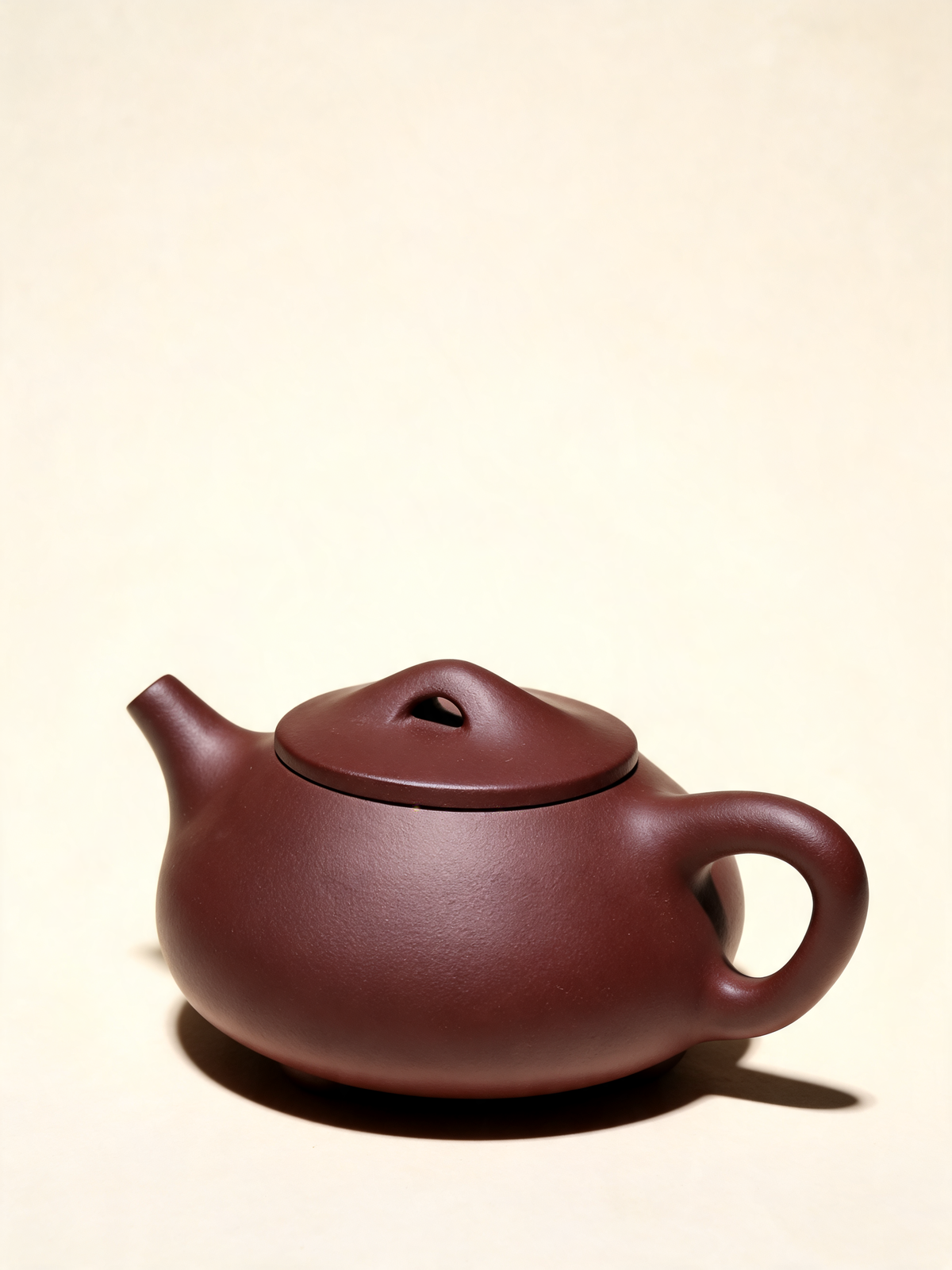 Detail of the matte Zi Ni purple clay surface on the Shi Piao Teapot