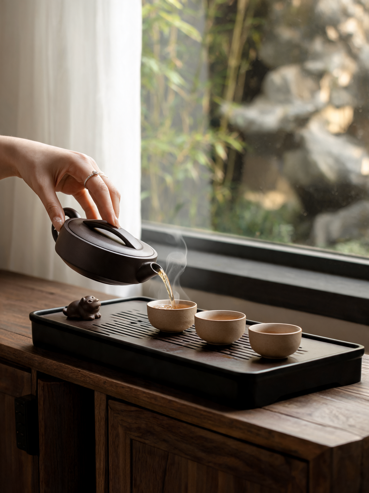 Handmade Zisha Ebony teapot spout and unglazed clay finish
